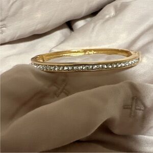 The Swarovski Gold Tone Bangle Bracelet